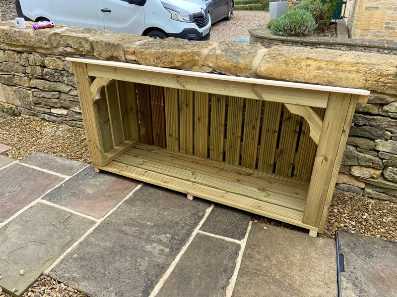 medium sized wooden log store for garden