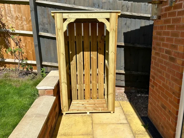 medium sized wooden log store for garden