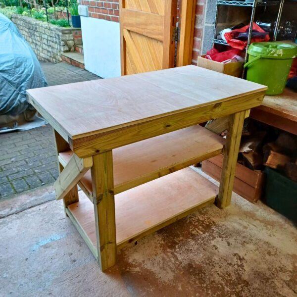 Stained wooden desk or tabletop with polished hardwood surface in a home interior