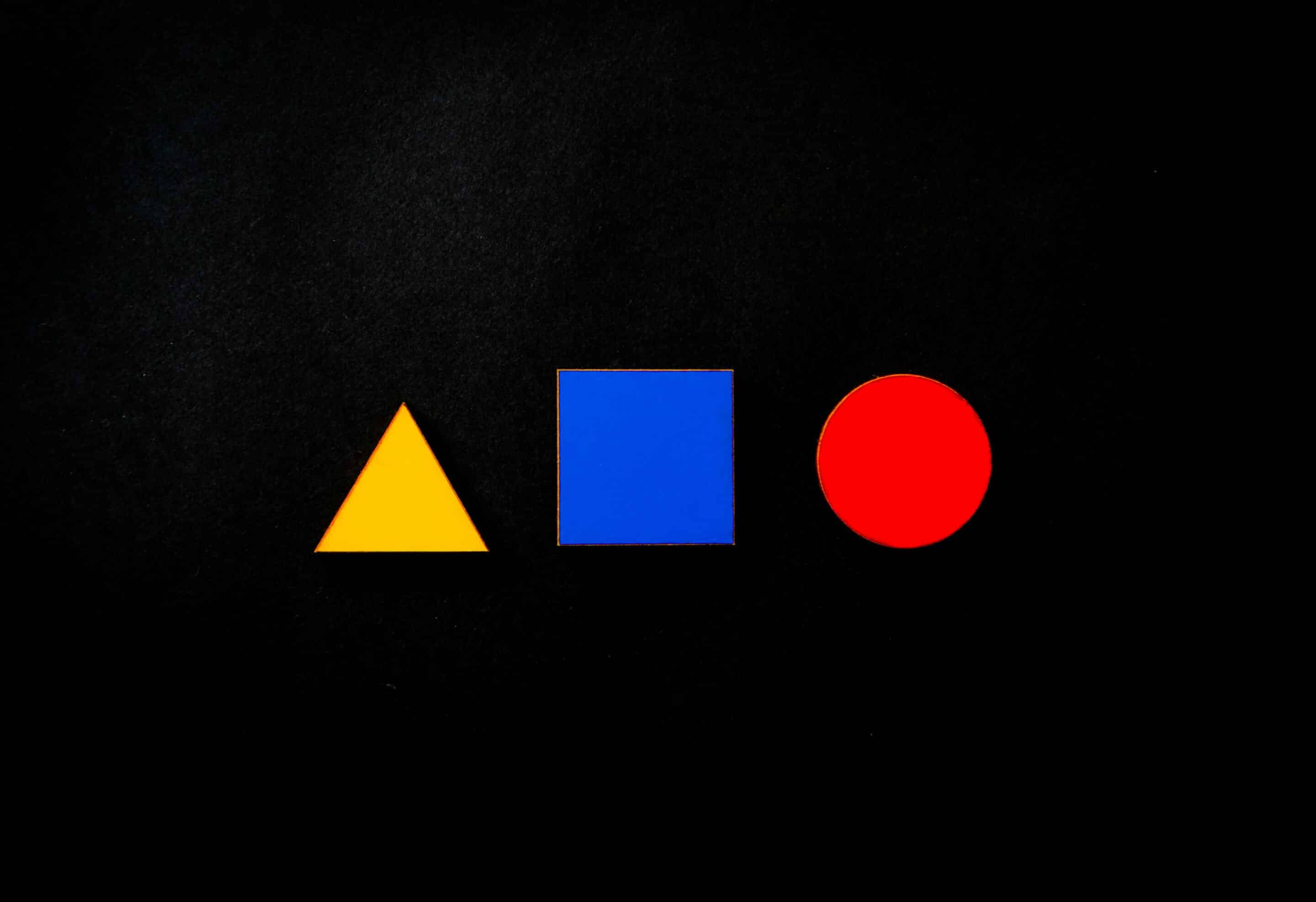 multi-coloured shapes on a black background